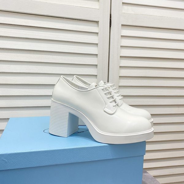 Prada Heeled Brushed Leather Lace-Ups