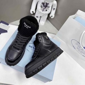 Prada Leather And Shearling High-Top Sneakers