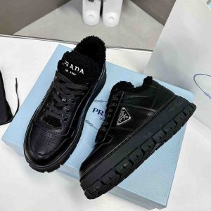 Prada Leather And Shearling Sneakers