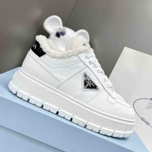 Prada Leather And Shearling Sneakers